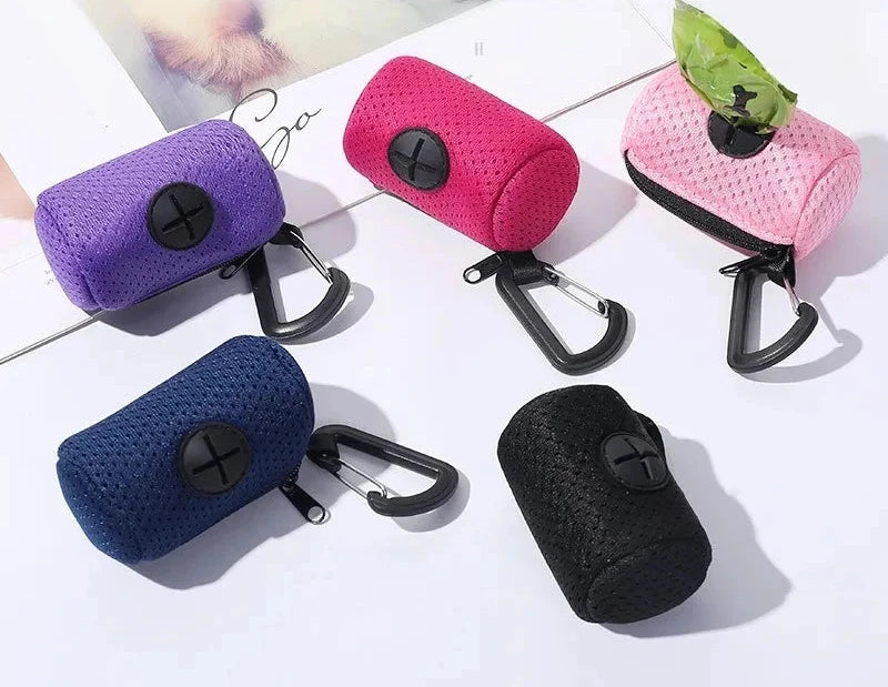 Dispensador y bolsas para excrementos de perros.